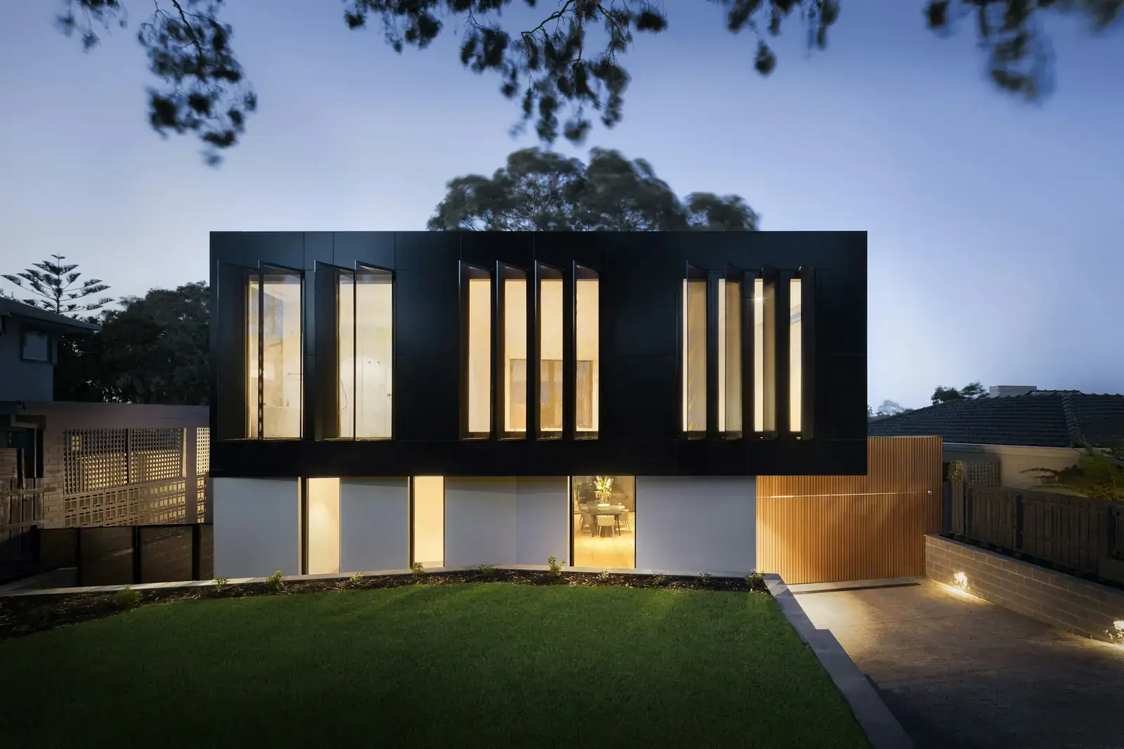 Dark timber house at twilight